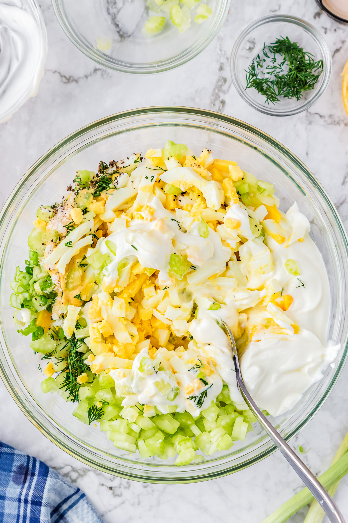 mixing healthy egg salad