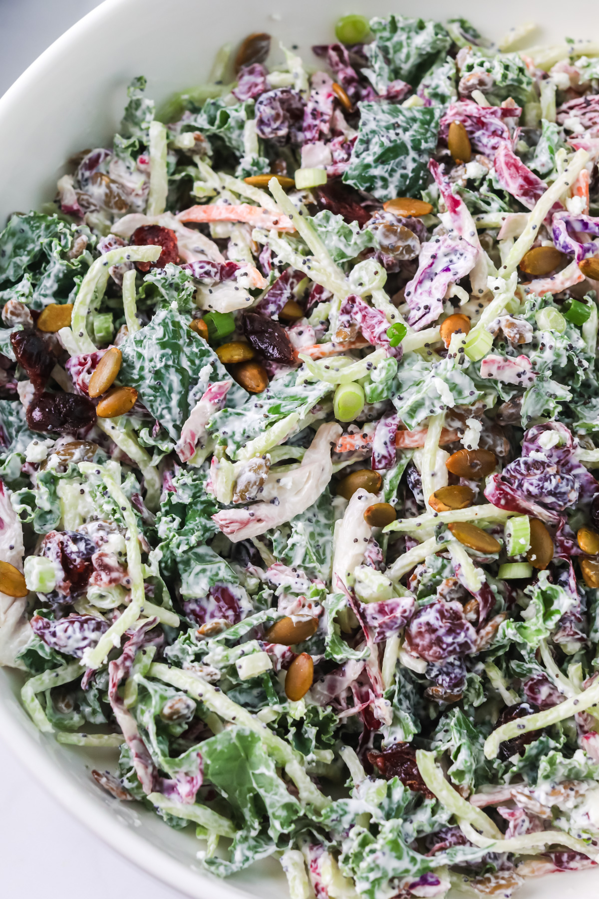 Sweet kale salad in bowl.