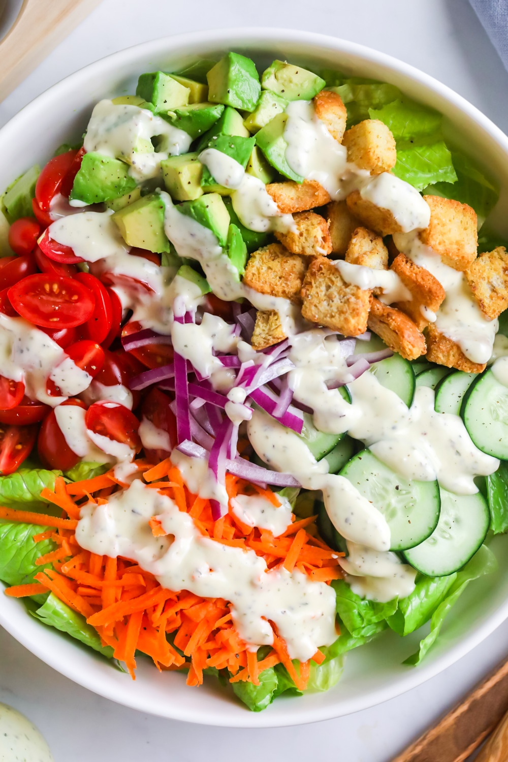 Side salad with creamy dressing. 