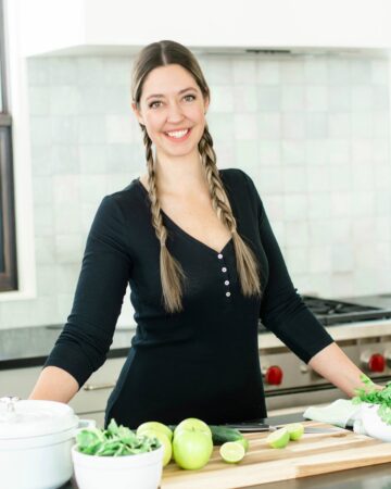 Woman in kitchen.